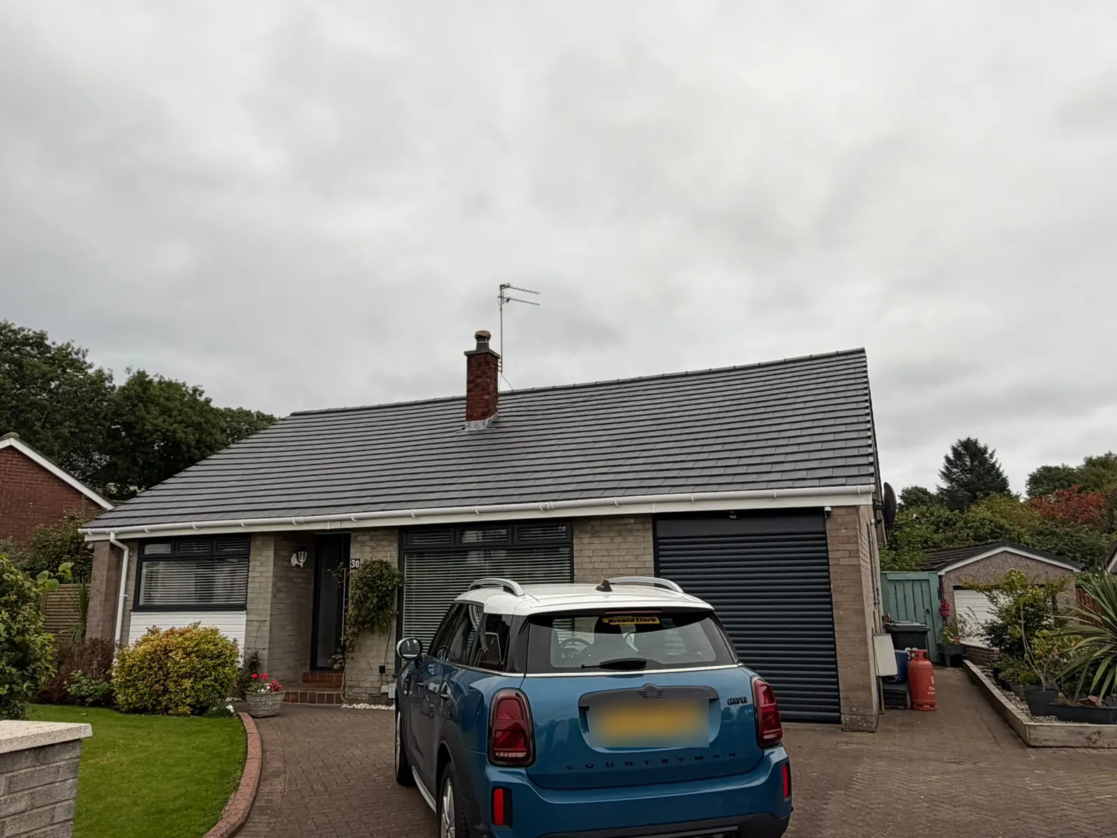 Bungalow re tiled with new grey tiles